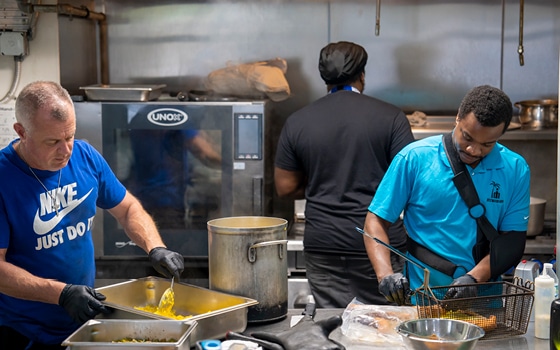 Men in the kitchen working Supported Living Program